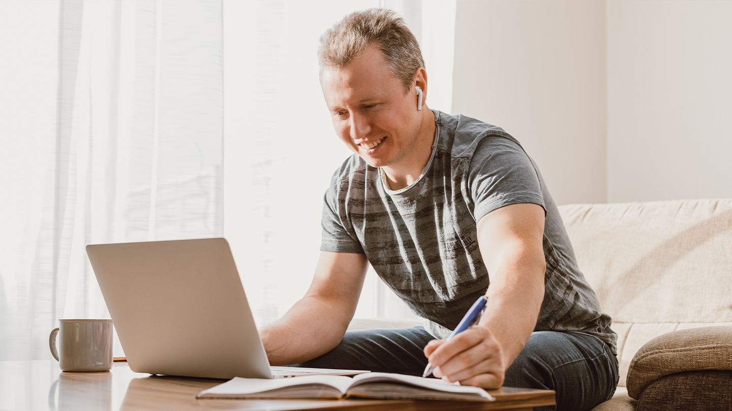 Adult student attending an online English class